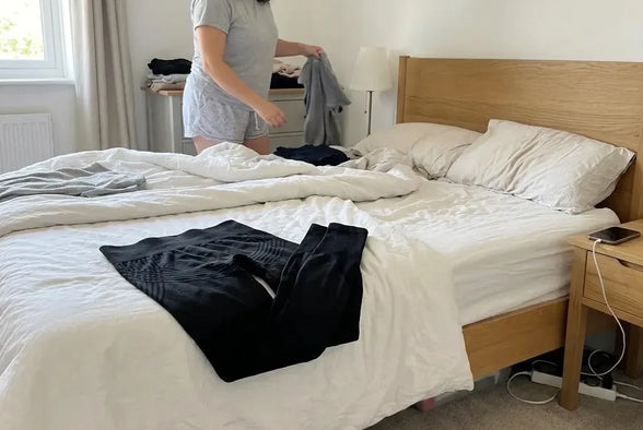 The leggings folded on the bed, day one