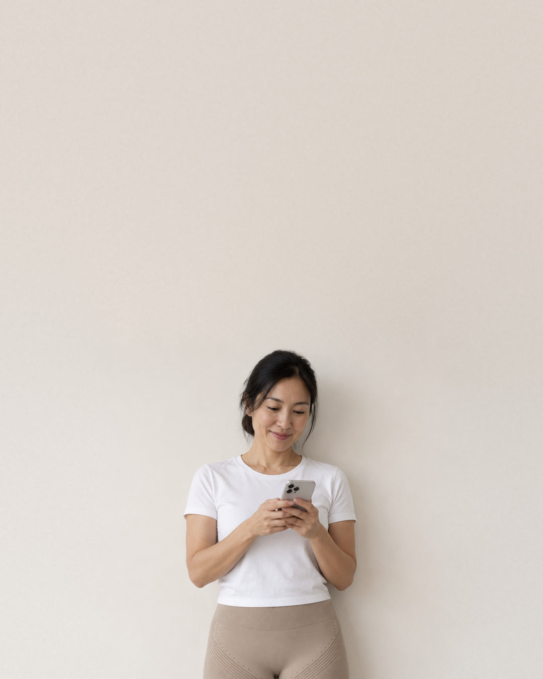 Woman reading a message on her phone