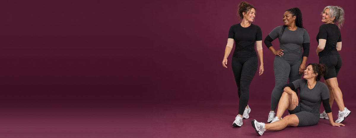 Four women wearing the 3D complete set in black and dark gray