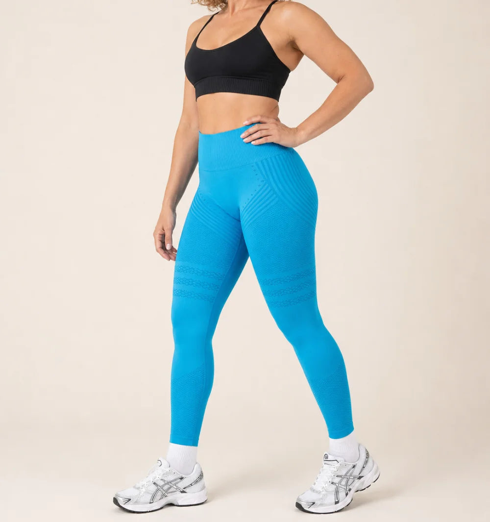 3D Leggings in Sky Blue, three-quarter view of the seamless knit with raised 3D panels