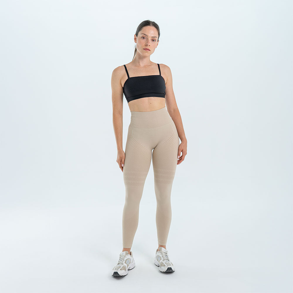 Beige 3D legging on a white background, front view