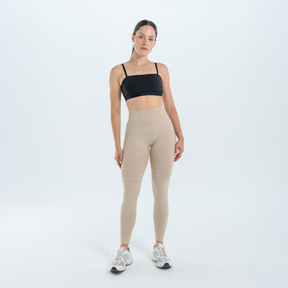 Beige 3D legging on a white background, front view