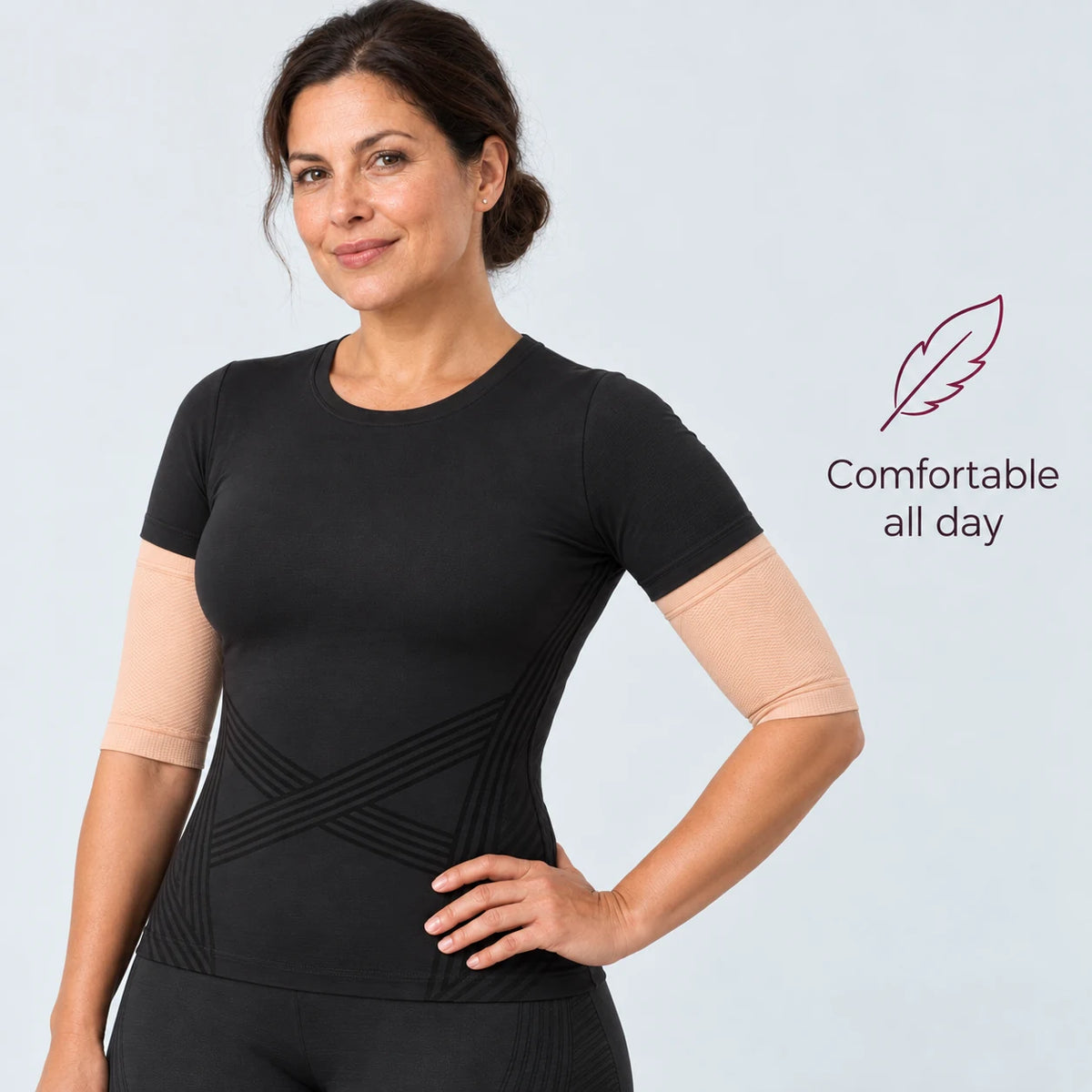 Woman wearing the black 3D t-shirt with nude 3D arm sleeves: comfortable all day