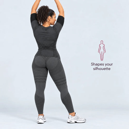 Back view of the Full Dark Gray set with arms raised: shapes your silhouette