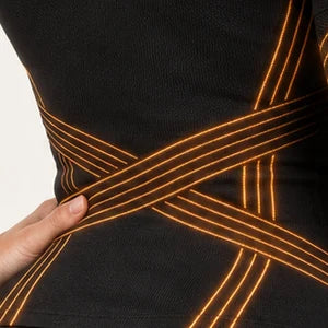 Crossing 3D lines of the Sculpting T-Shirt glowing at the waist